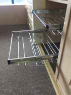 Slide-out wire shoe racks Slide-out wire shoe racks