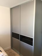 Small wardrobe with cashmere and black glass