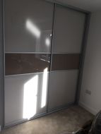 Small wardrobe with cream and light brown glass