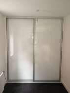 Plain white doors with matt silver frames