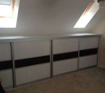 Short Hacienda white doors witha black glass band