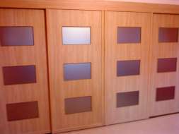 Stylo wood doors with a matt bronze glass