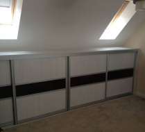 Short Hacienda white doors witha black glass band