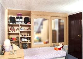 Open shelving with a 2 door sliding wardrobe